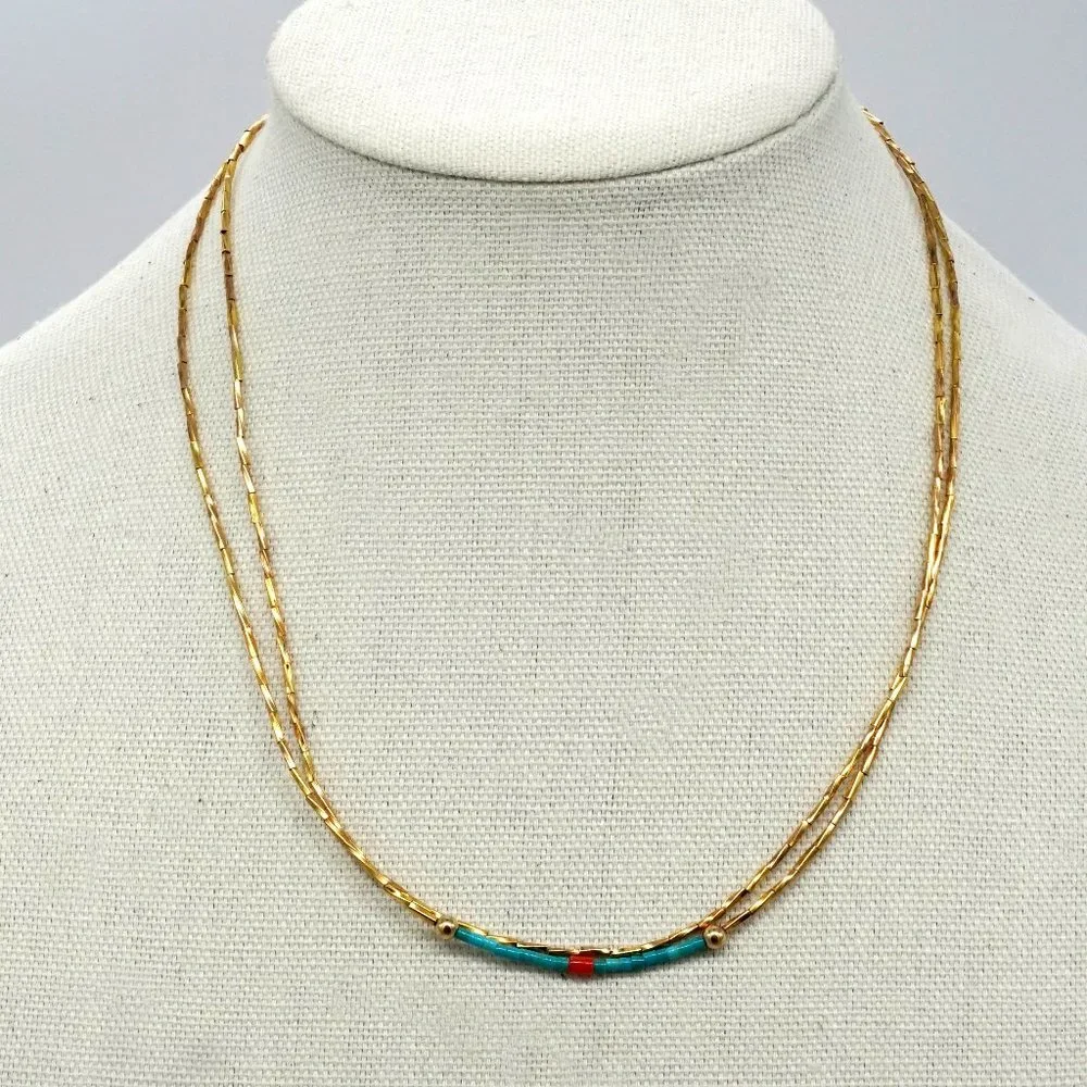 Minimalistic bead style necklace with blue rice beads. - Picture 1 of 2